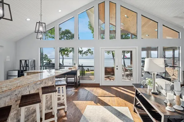 a large living room with large windows