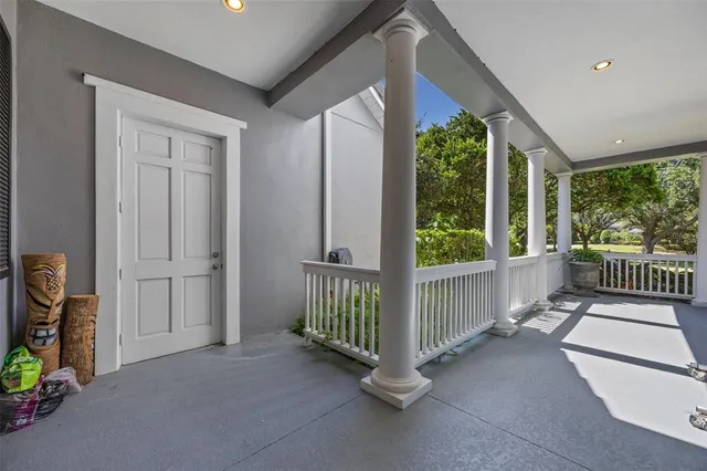 a living room with a fireplace and a window