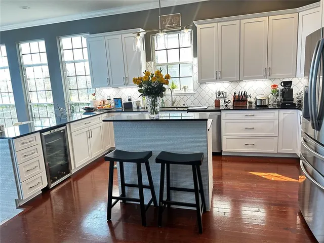 a view of a house with a big yard