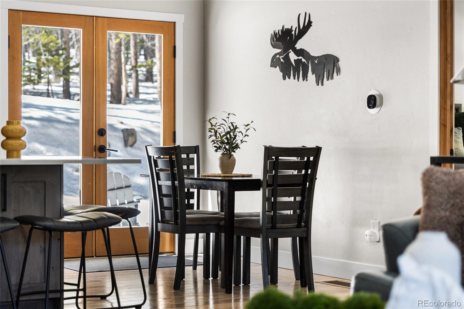 79 Beaver Road Idaho Springs, CO 80452 - Photo 23 of 50 a view of a dining room with furniture and window