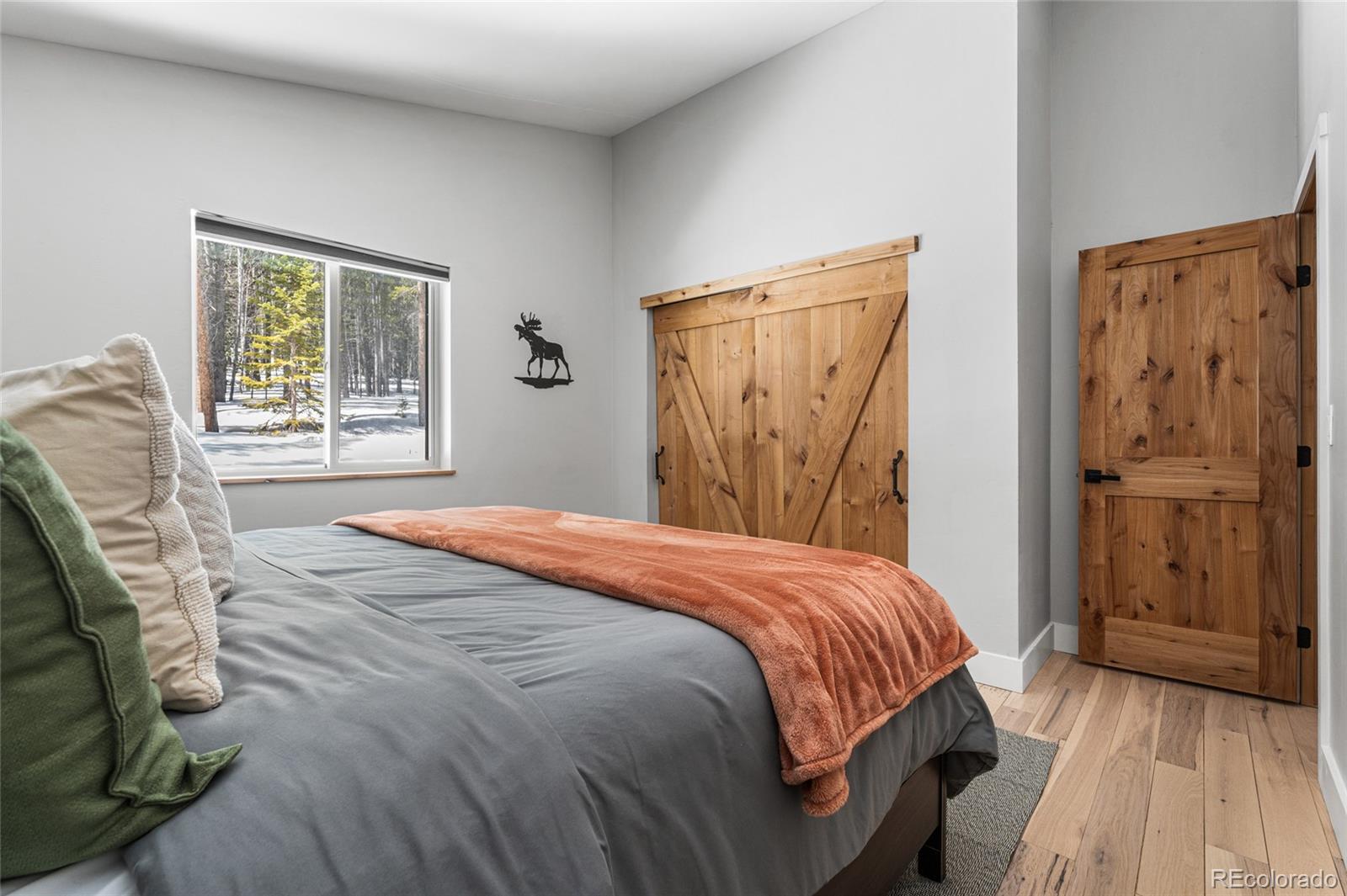 79 Beaver Road Idaho Springs, CO 80452 - Photo 34 of 50 a bedroom with a bed and a window