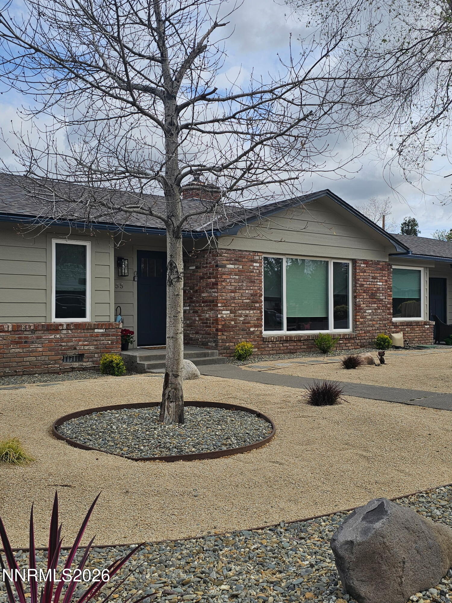 1355 Charles Drive Reno, NV 89509 - Photo 2 of 26 a front view of a house with porch
