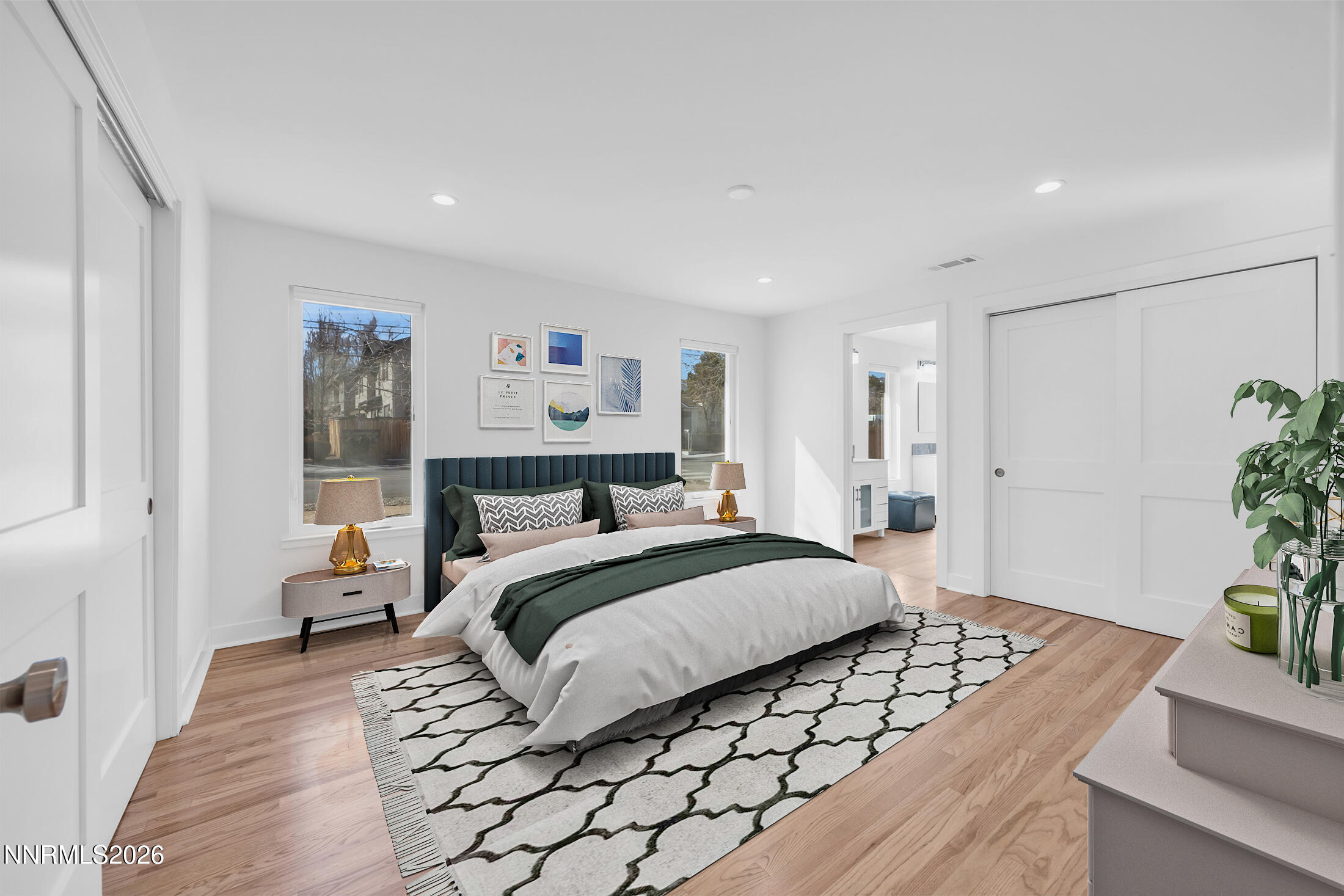 1355 Charles Drive Reno, NV 89509 - Photo 5 of 26 a bedroom with a bed and a potted plant