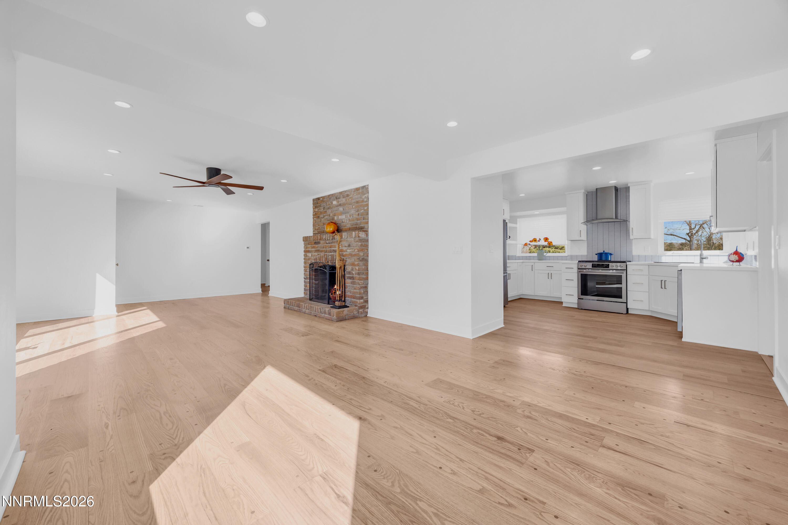 1355 Charles Drive Reno, NV 89509 - Photo 7 of 26 a view of empty room with wooden floor