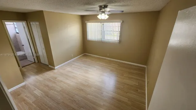 a bathroom with a double vanity sink and mirror