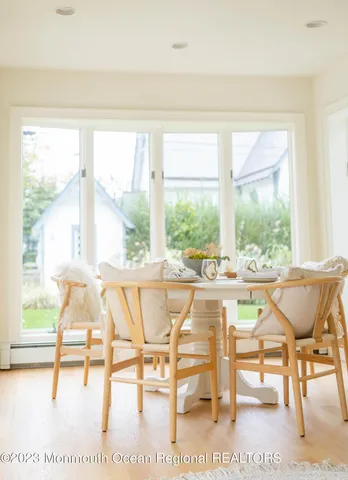a spacious bedroom with a bed and a window