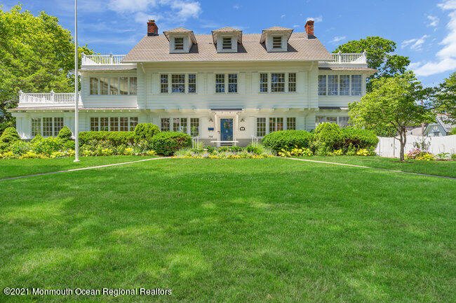 501 3rd Avenue Spring Lake, NJ 07762 - Photo 2 of 61 a front view of a house with a yard