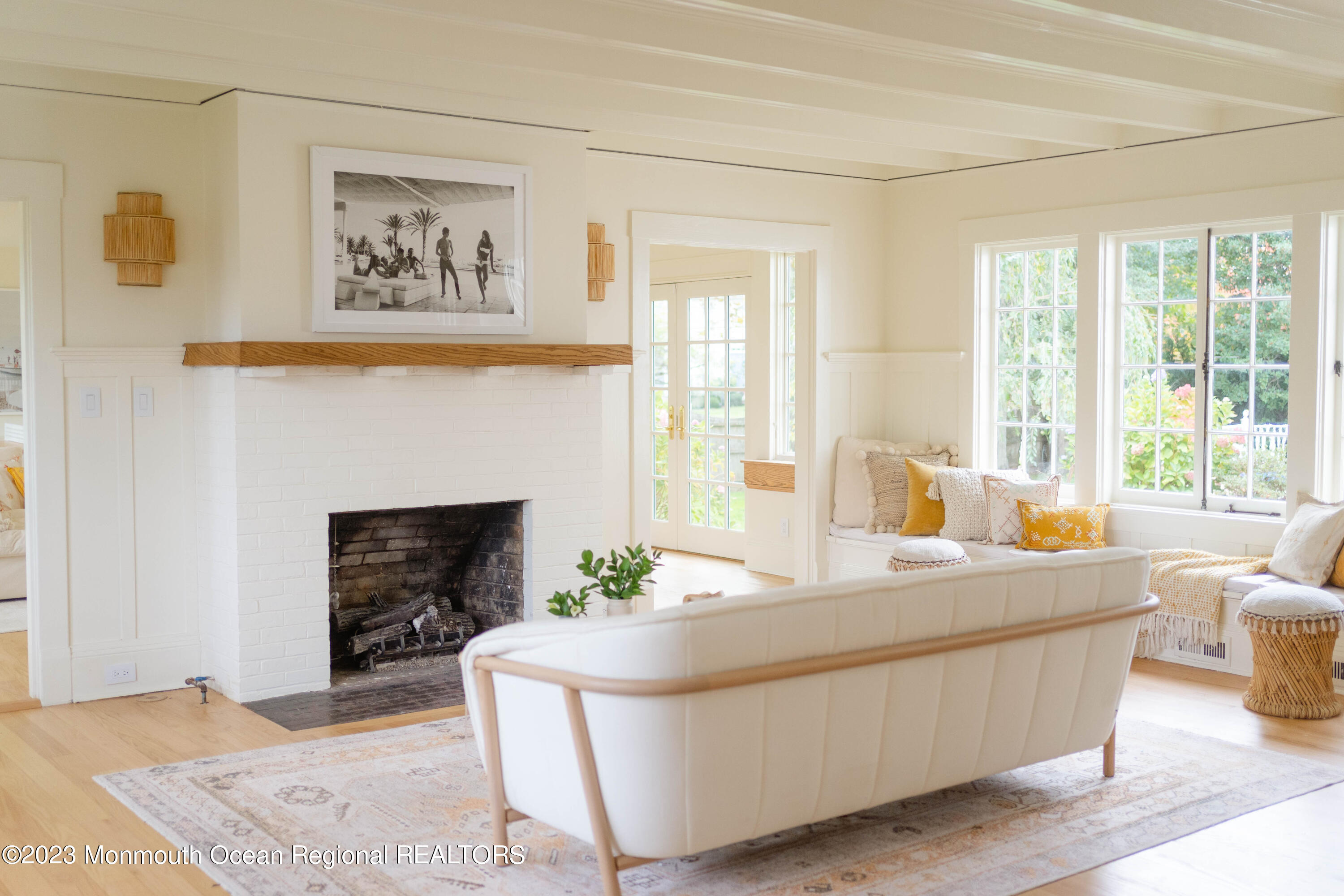 501 3rd Avenue Spring Lake, NJ 07762 - Photo 21 of 61 a living room with furniture and a fireplace