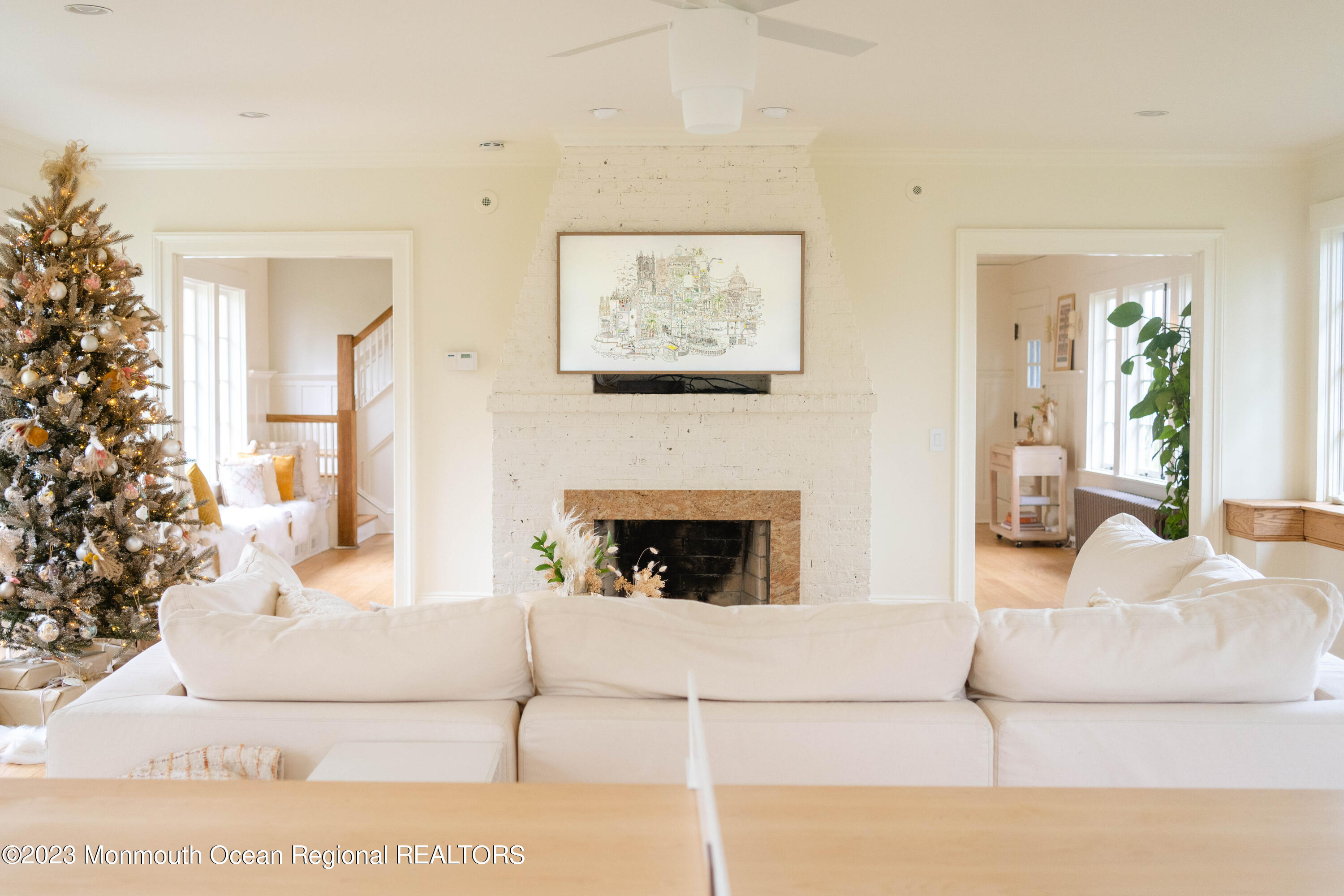 501 3rd Avenue Spring Lake, NJ 07762 - Photo 23 of 61 a living room with furniture and a fireplace