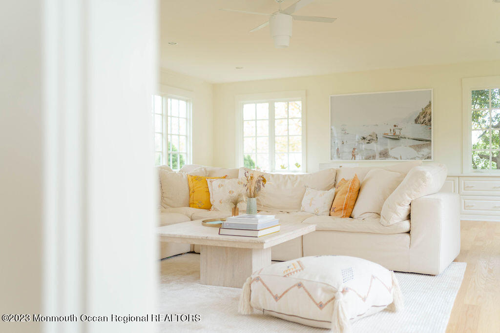 501 3rd Avenue Spring Lake, NJ 07762 - Photo 25 of 61 a living room with furniture a table and chair