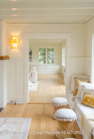 a living room filled with furniture and decor