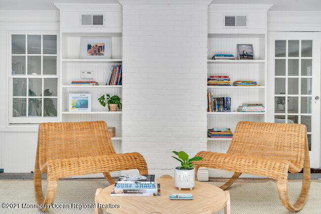 501 3rd Avenue Spring Lake, NJ 07762 - Photo 36 of 61 a living room filled with furniture and decor