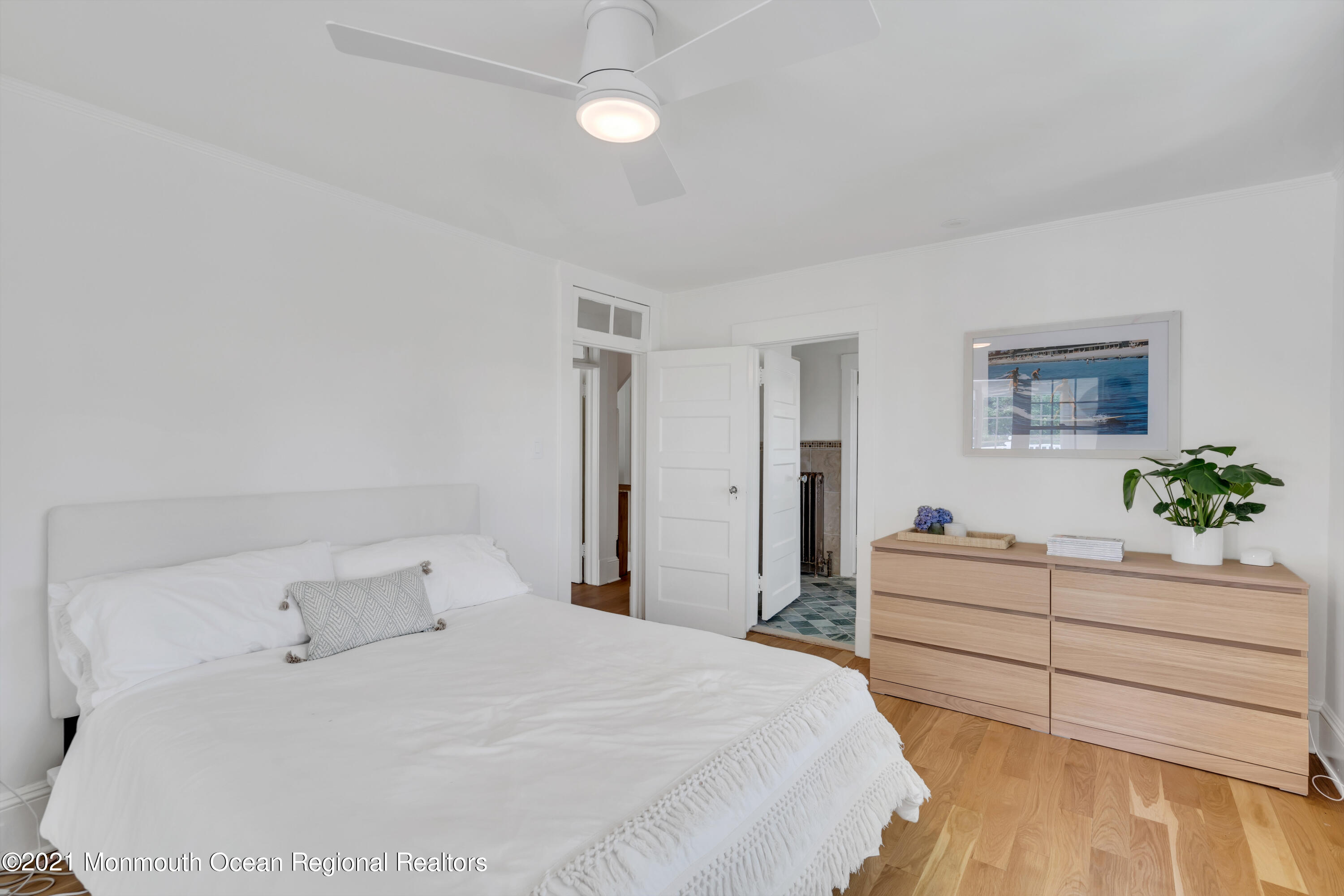 501 3rd Avenue Spring Lake, NJ 07762 - Photo 39 of 61 a bedroom with a bed and a dresser