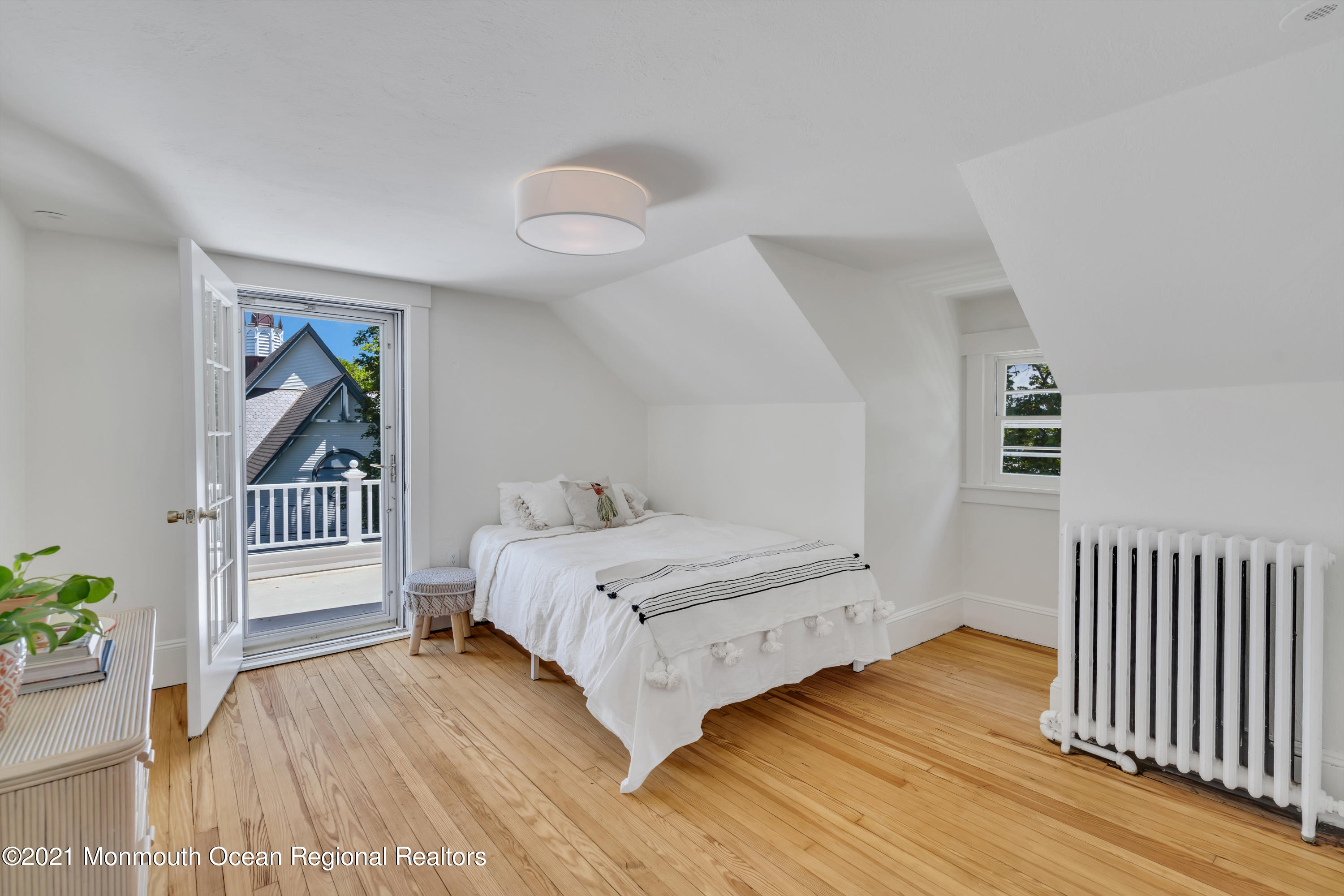 501 3rd Avenue Spring Lake, NJ 07762 - Photo 41 of 61 a bedroom with a bed and a window