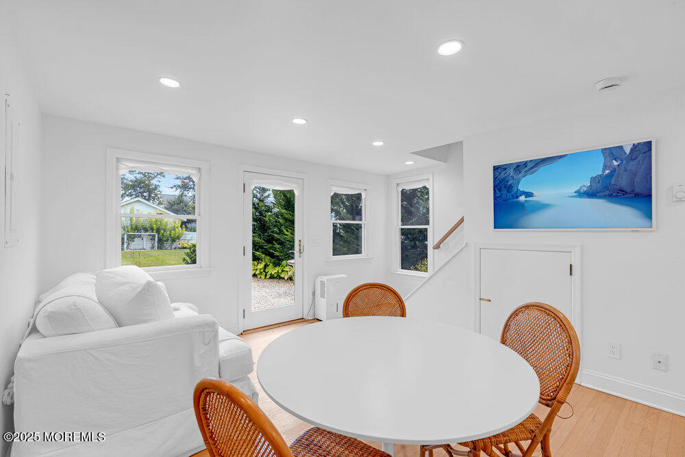 501 3rd Avenue Spring Lake, NJ 07762 - Photo 48 of 61 a living room with furniture and a swimming pool