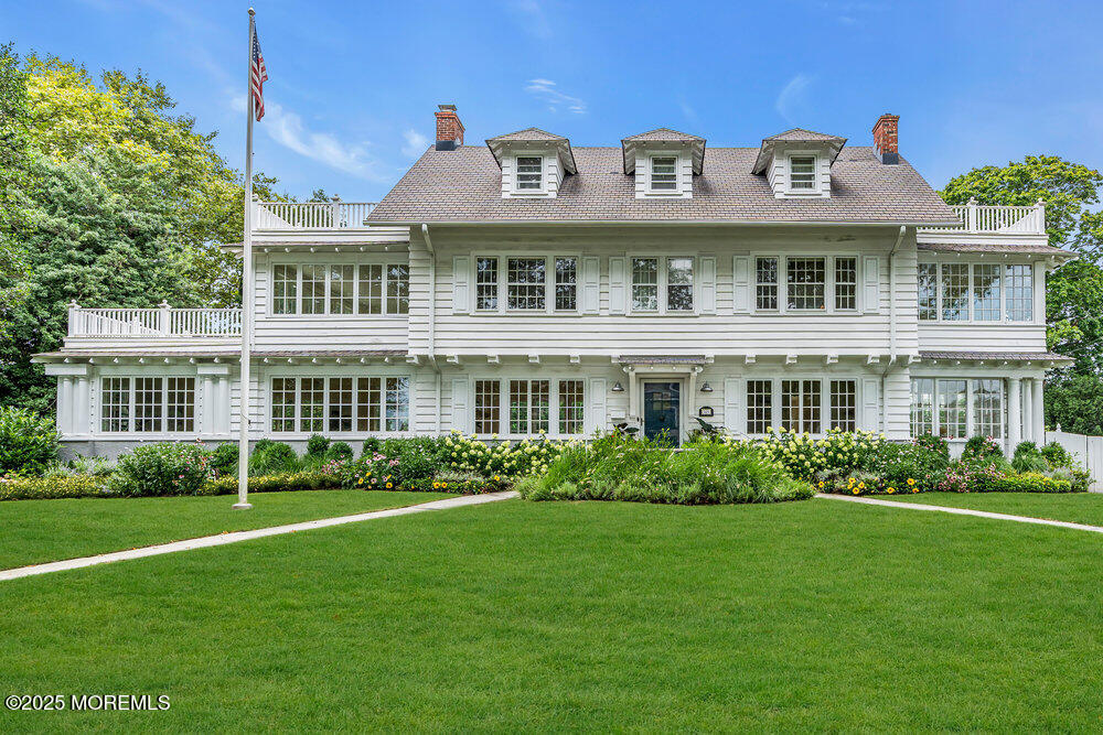 501 3rd Avenue Spring Lake, NJ 07762 - Photo 59 of 61 a front view of a house with a yard