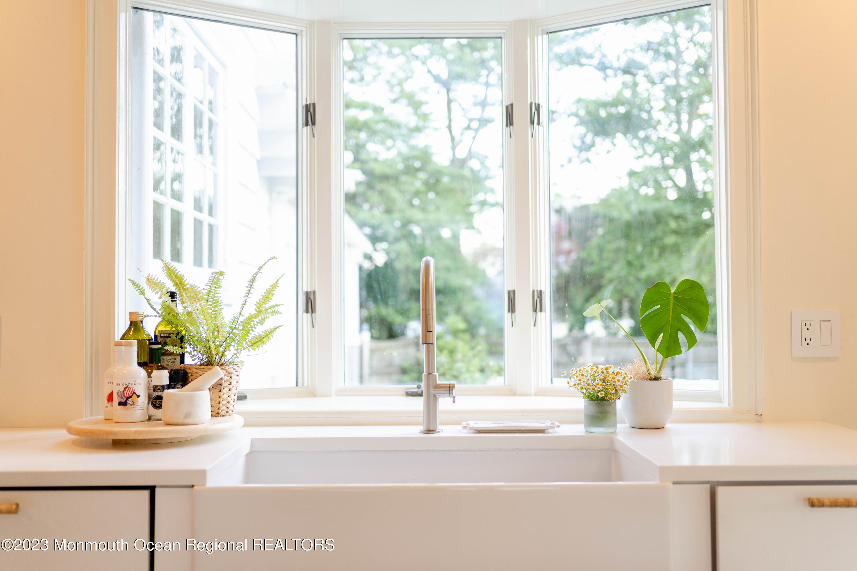 501 3rd Avenue Spring Lake, NJ 07762 - Photo 8 of 61 a bathroom with a window a sink and a window