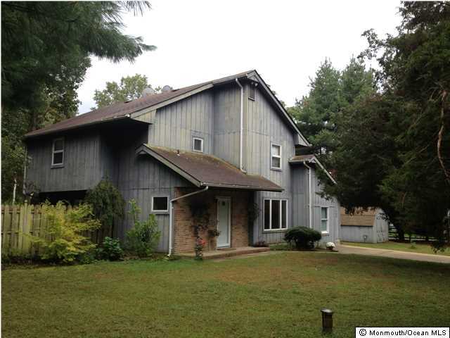 795 Hulses Corner Road Howell, NJ 07731 - Photo 1 of 22 a front view of a house with a garden