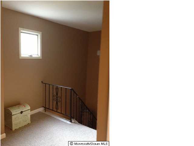 795 Hulses Corner Road Howell, NJ 07731 - Photo 16 of 22 a view of a hallway