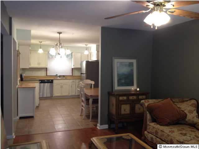 795 Hulses Corner Road Howell, NJ 07731 - Photo 4 of 22 a kitchen with stainless steel appliances kitchen island granite countertop a sink and cabinets