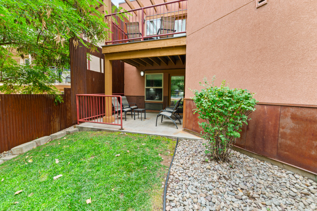 100 West 200 South, Unit 118 Moab, UT 84532 - Photo 27 of 39 View of yard featuring a patio area and a balcony
