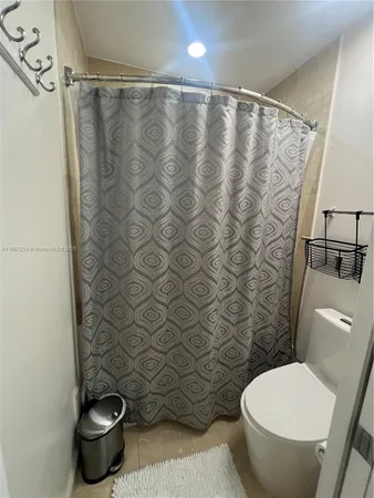 a room with gym equipment and view