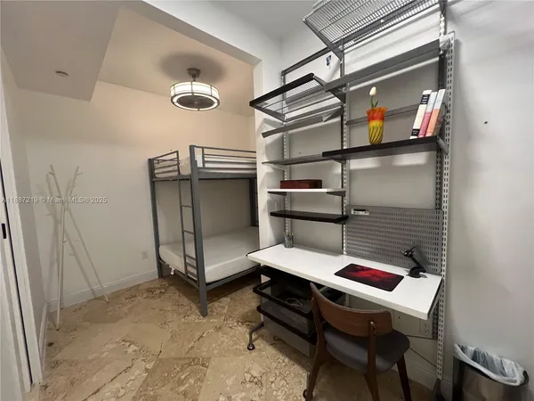 a bathroom with a sink and a window