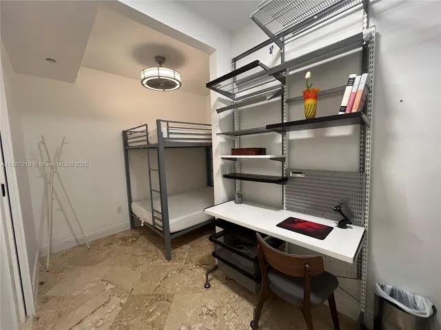 a bathroom with a sink and a window