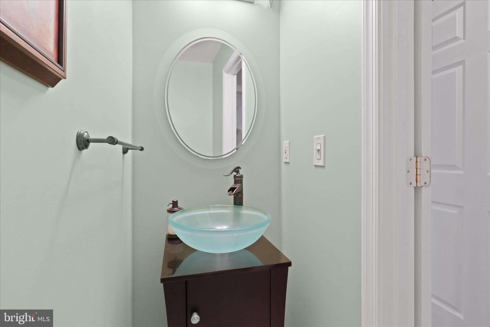 7914 Idylwood Road Dunn Loring, VA 22027 - Photo 22 of 41 a bathroom with a sink and a mirror