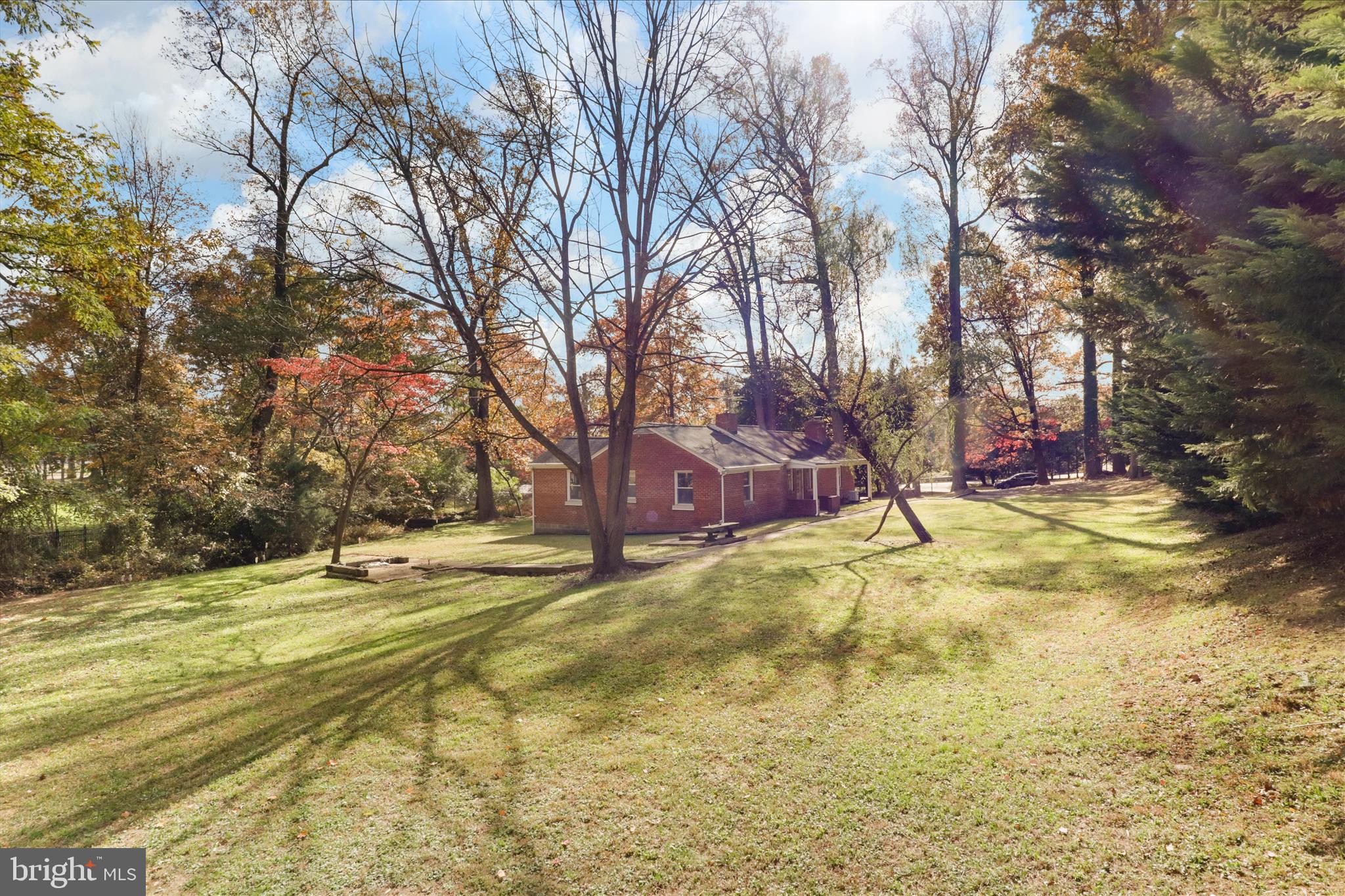 7914 Idylwood Road Dunn Loring, VA 22027 - Photo 27 of 41 a view of yard with tree and wooden fence