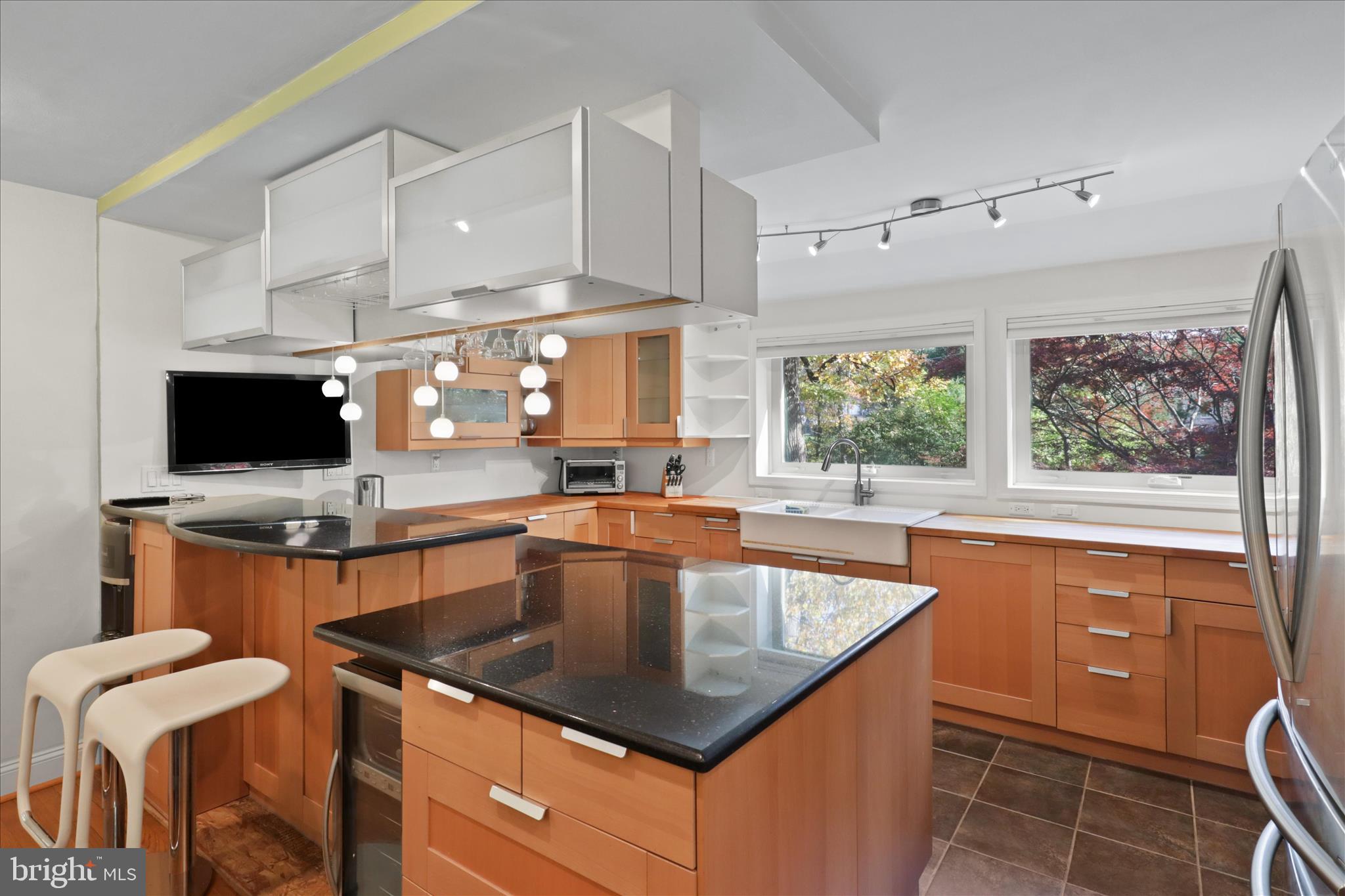 7914 Idylwood Road Dunn Loring, VA 22027 - Photo 10 of 41 a kitchen with a sink a counter top space and appliances