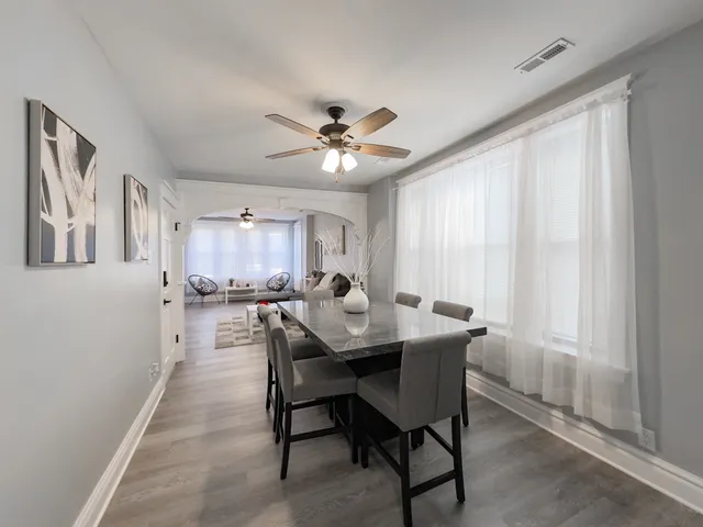 a view of a dining room with furniture