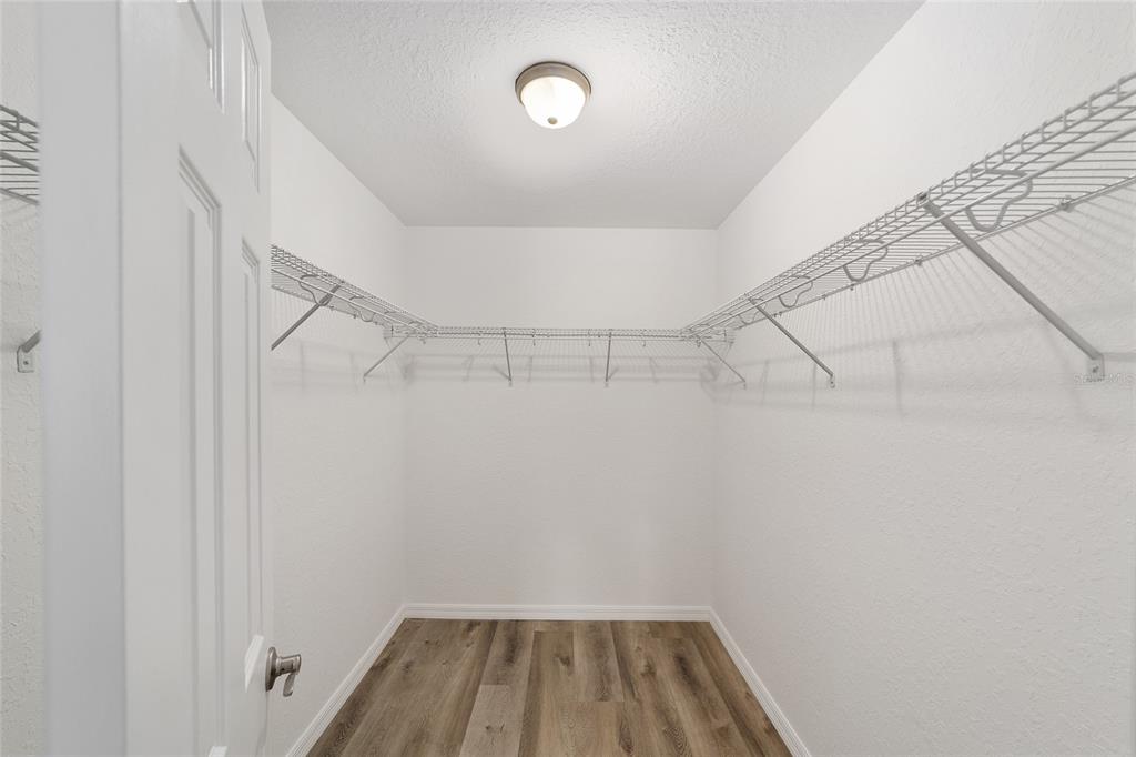 8767 North Quarry Way Dunnellon, FL 34434 - Photo 12 of 18 a view of a room with racks on the wall