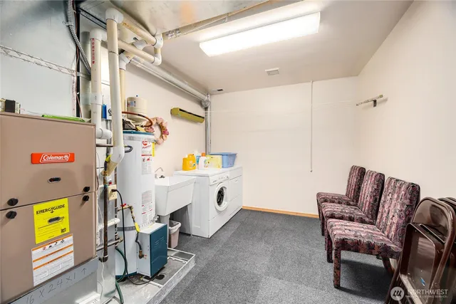 a view of a two chairs in the balcony