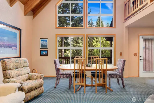 a view of a livingroom and dining room