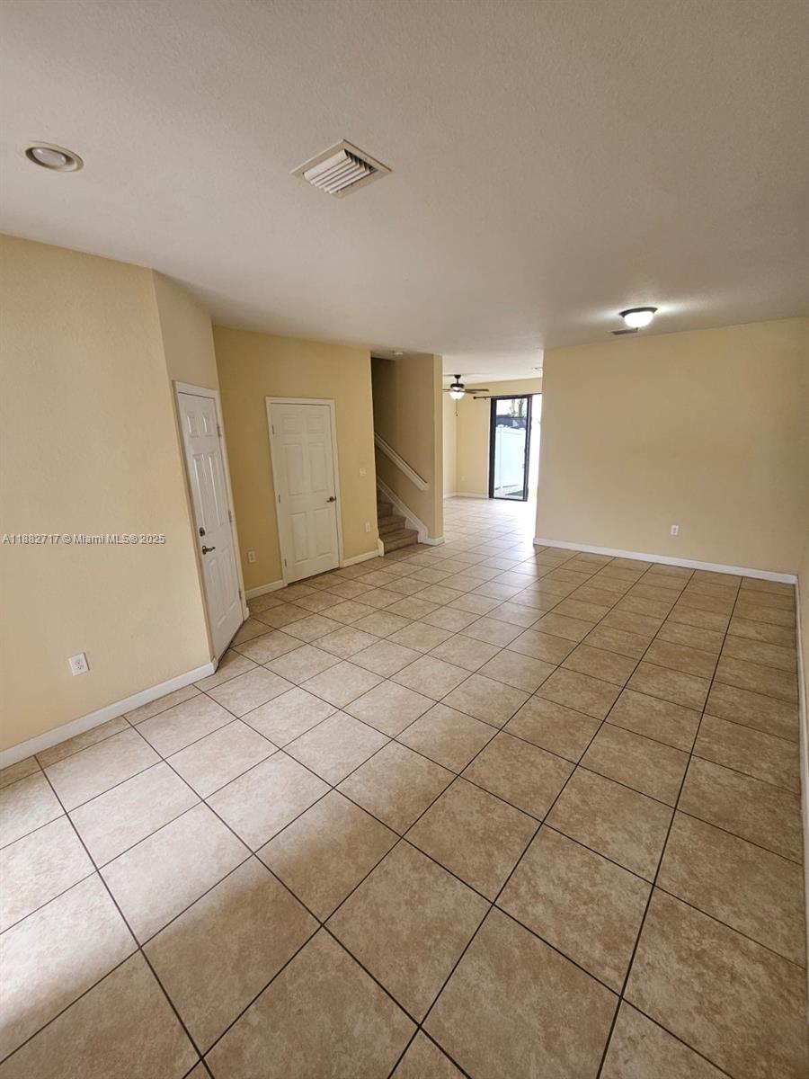 3387 West 90th Street Hialeah, FL 33018 - Photo 3 of 11 a view of a livingroom with an empty space and a window