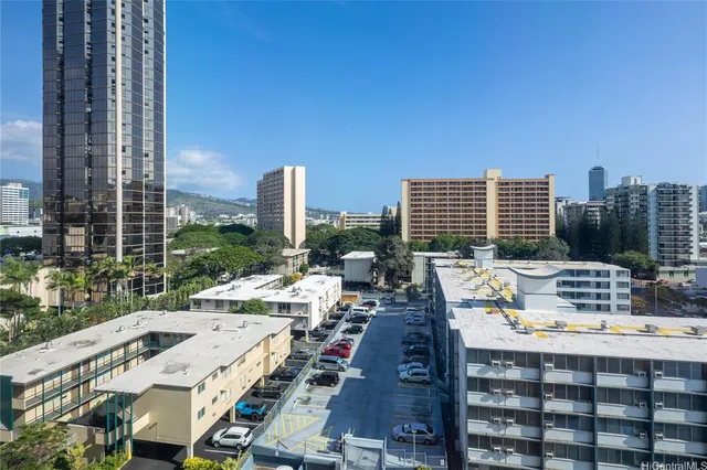 a view of city with tall buildings