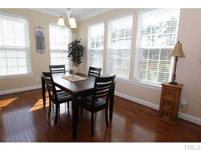 5807 Claribel Court Raleigh, NC 27612 - Photo 8 of 24 Sunny breakfast room with lots of natural light. Beautiful hardwood floors. Breakfast Area