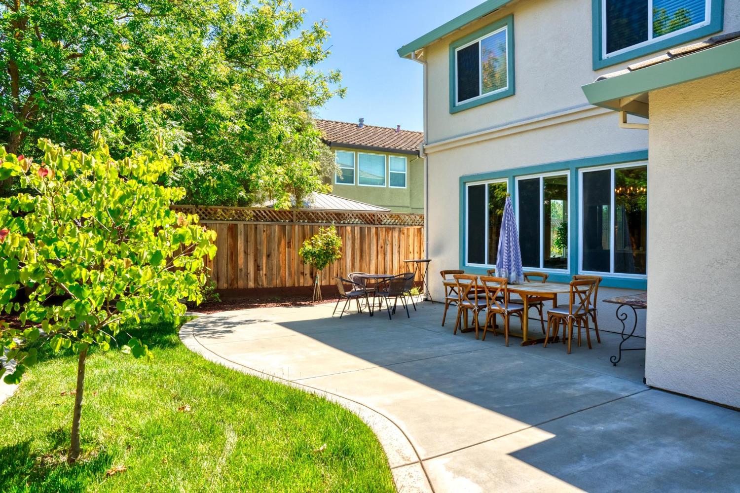 426 South Highland Avenue Ripon, CA 95366 - Photo 76 of 82 a view of a house with backyard and sitting area
