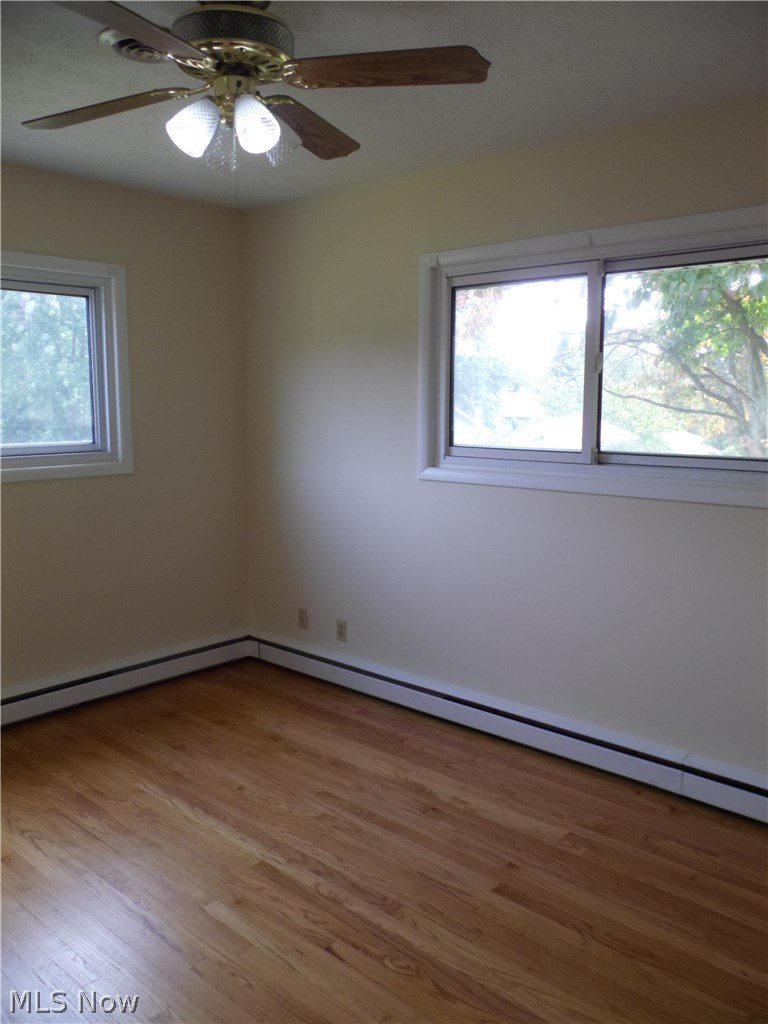 1830 Toepfer Road Akron, OH 44312 - Photo 16 of 25 Master bedroom with hardwood floors