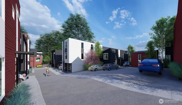 a view of backyard with a table and chairs and a fire pit
