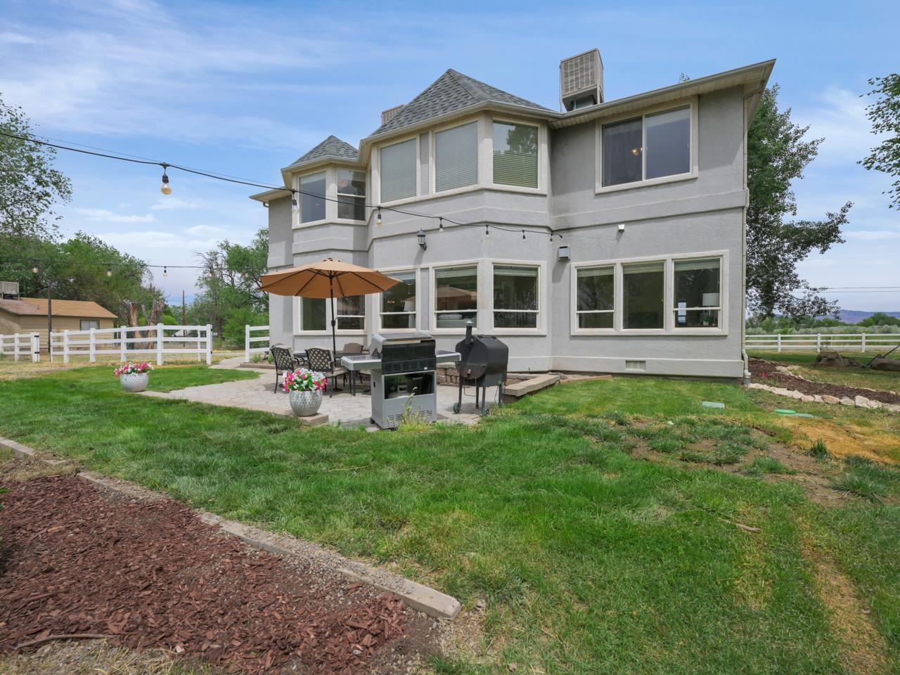 2433 H Road Grand Junction, CO 81505 - Photo 33 of 42 a house view with a garden space