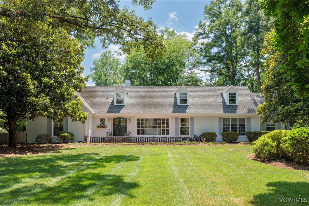 front view of a house with a yard