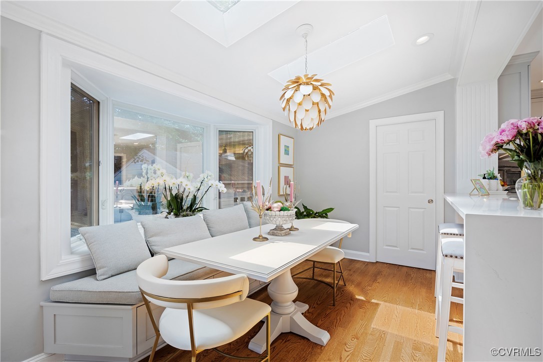 9603 River Road Henrico, VA 23229 - Photo 19 of 50 a view of a dining room with furniture and chandelier