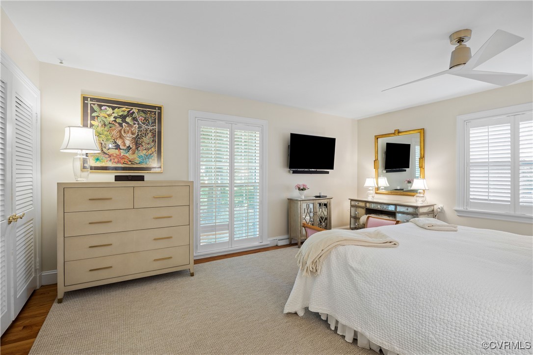 9603 River Road Henrico, VA 23229 - Photo 23 of 50 a bedroom with a bed and a flat screen tv