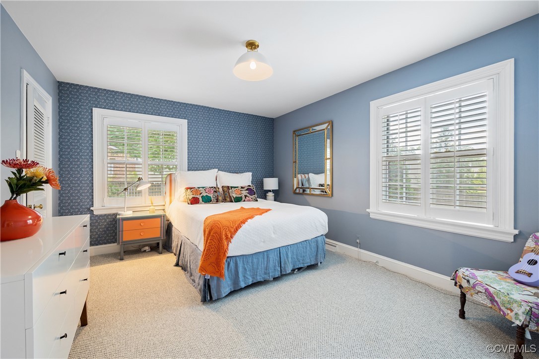 9603 River Road Henrico, VA 23229 - Photo 29 of 50 a bedroom with a bed and a window