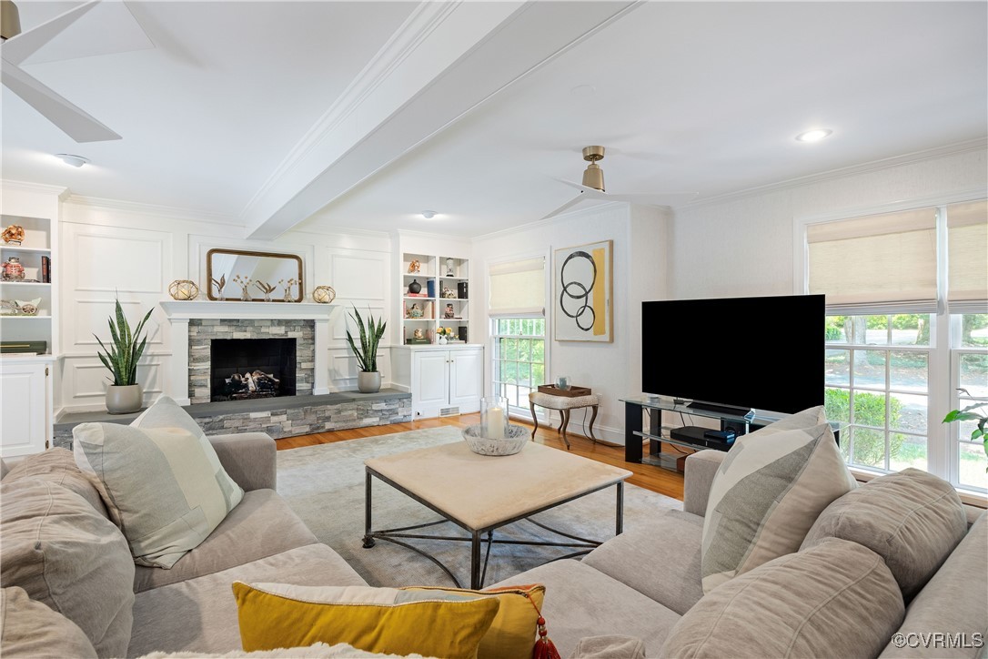 9603 River Road Henrico, VA 23229 - Photo 32 of 50 a living room with furniture and a flat screen tv