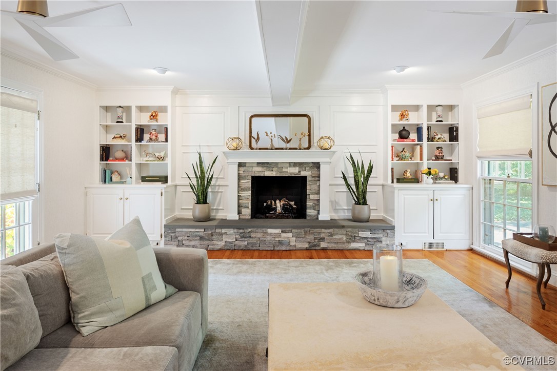 9603 River Road Henrico, VA 23229 - Photo 33 of 50 a living room with furniture and a fireplace