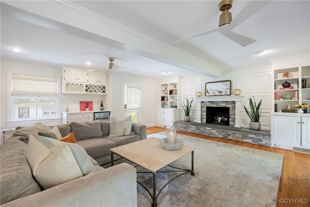 9603 River Road Henrico, VA 23229 - Photo 34 of 50 a living room with furniture and a fireplace