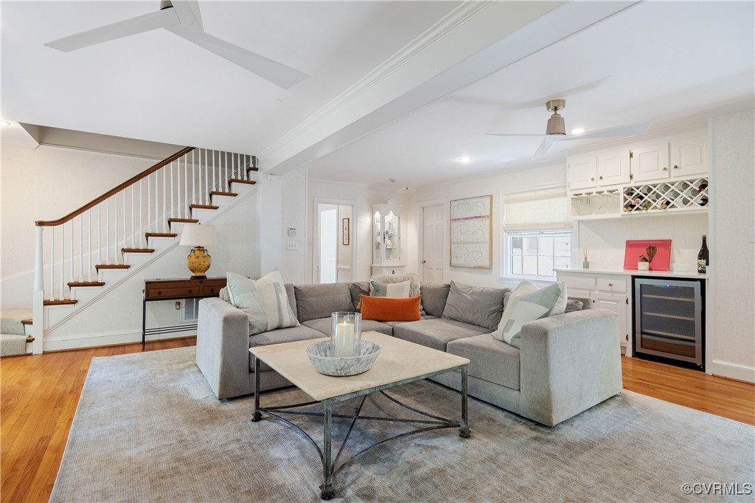 9603 River Road Henrico, VA 23229 - Photo 35 of 50 a living room with furniture and a dining table with wooden floor